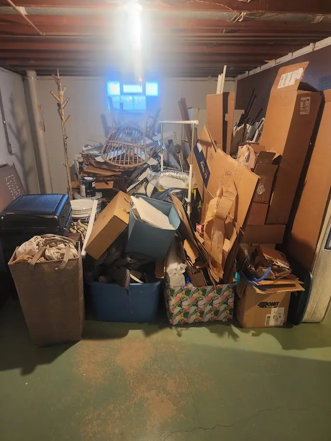 Roll-off dumpster container at job site for Yard Waste Dumpster Rental in Rollin